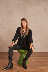 SUZY BLACK COATED-COTTON SLIM-FIT JEANS