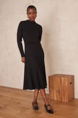 MARTIKA BLACK PLEATED KNIT DRESS
