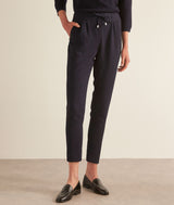 FLYNN NAVY FLUID CARROT TROUSERS