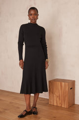 MARTIKA BLACK PLEATED KNIT DRESS