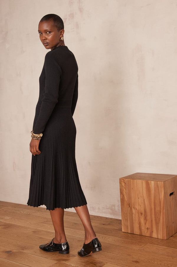 MARTIKA BLACK PLEATED KNIT DRESS