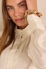 MAY CREAM HIGH-NECK SATIN BLOUSE