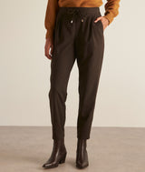 FLYNN BROWN LOOSE-FIT CARROT TROUSERS